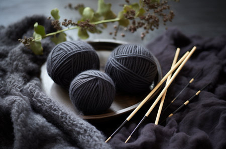 Gray yarn and knitting needles. Knitting. A ball of thread. Hobbyの素材