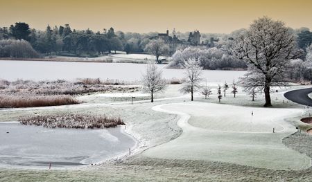 photo winter cold scenic landscape lake with castle in distance, irelandの写真素材