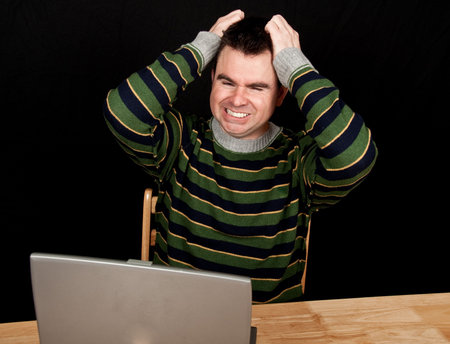 photo casual male on laptop with black screen drop