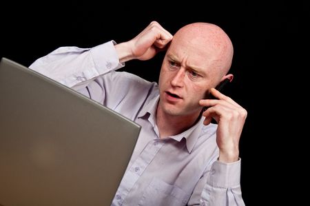 photo male in his 30's in shirt on black back dropの写真素材