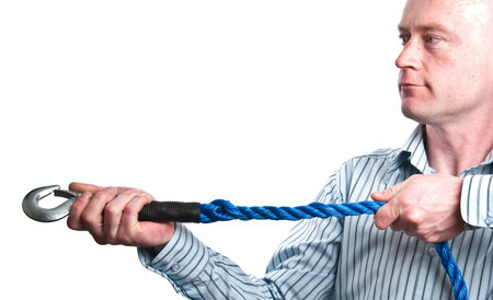 photo concept male hand on blue rope on white