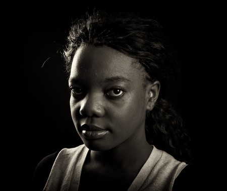 photo beautiful back woman portrait on blackの写真素材