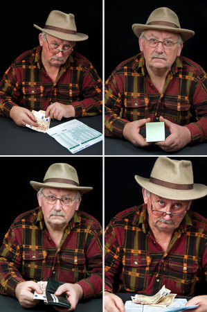 photo senior male portrait, man with money worriesの写真素材