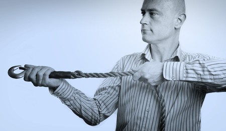 photo portrait of business man concept with rope の写真素材