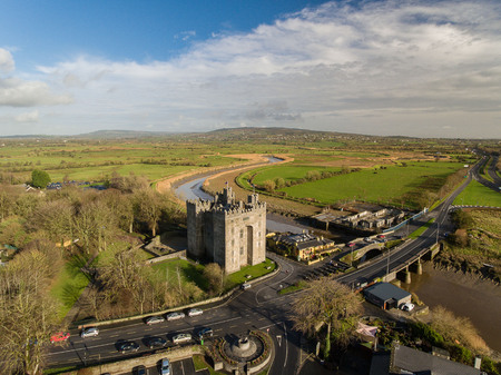 Bunratty Castle and Durty Nelly's Irish Pub, Ireland - Jan 31st 2017: Aerial view of Ireland's most famous Castle and Irish Pub in County Clare. Famous world tourist attraction. Bunratty Castle and Durty Nelly's Pub.のeditorial素材