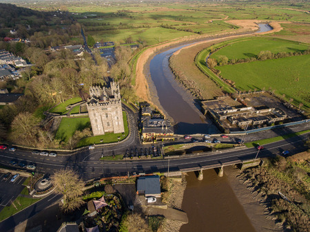 Bunratty Castle and Durty Nelly's Irish Pub, Ireland - Jan 31st 2017: Aerial view of Ireland's most famous Castle and Irish Pub in County Clare. Famous world tourist attraction. Bunratty Castle and Durty Nelly's Pub.のeditorial素材