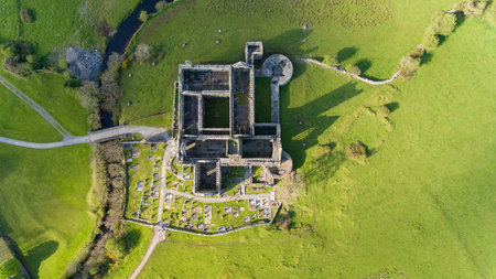 Aerial view of an Irish public free tourist landmark, Quin Abbey, County clare, Ireland. Aerial landscape view of this beautiful ancient celtic historical architecture in county clare ireland.の写真素材