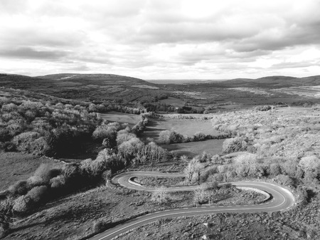 black and white landscapephotograph from the burren national park in county clare, irelandの写真素材