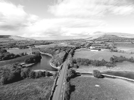 black and white landscapephotograph from the burren national park in county clare, ireland