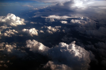 beautiful bright clouds, view from above, in the right is the shadow of a big cloud.の写真素材