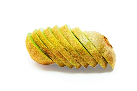 Freshly sliced kiwi on a white backgroundの写真素材