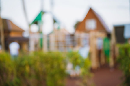 blurred background of playground in park on summer day. high quality photoの写真素材