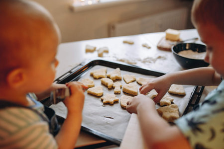 children making christmas cookies. high quality photoの写真素材