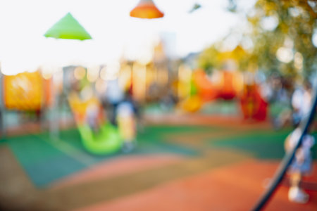 blurred background of playground in park on summer day. High quality photoの写真素材