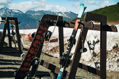 wooden stand with snowboard and ski on mountain resort. High quality photoの写真素材