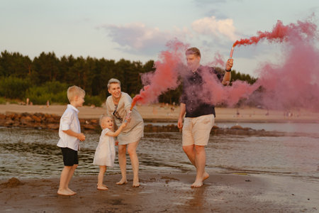 Gender reveal announcement on the beach. Loving family expecting baby girl. Happy moments. High quality photoの写真素材