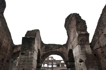 The upper part of the main entrance of The Colisseum in Rome,Italy の写真素材