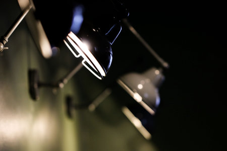 Close-up of a lamp in a dark room. Selective focus.のeditorial素材