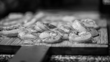 Fried shrimp on a cutting board. Selective focus. Toned.の写真素材