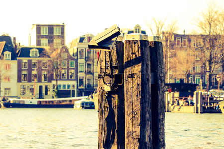 Cctv camera on the old wooden post in Amsterdam, Holland