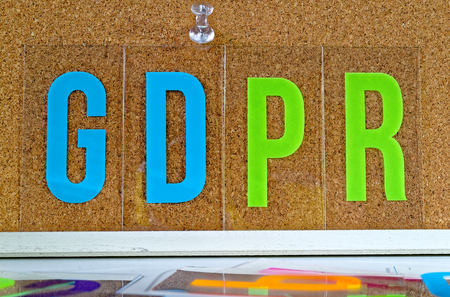 Board with the inscription in german: DSGVO (Datenschutzgrundverordnung) in english: GDPR (General Data Protection Regulation)の写真素材