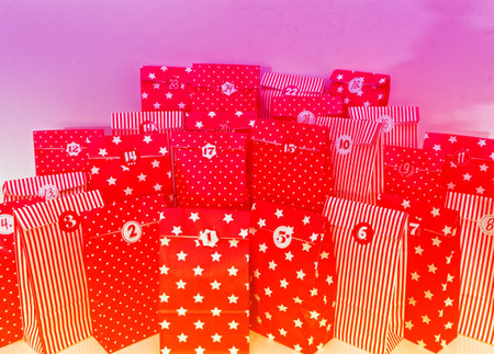 Door of an advent calendar with 24 parcels in red with in german Frohe Weihnachten 2018 in english Merry Chrstmas 2018の写真素材
