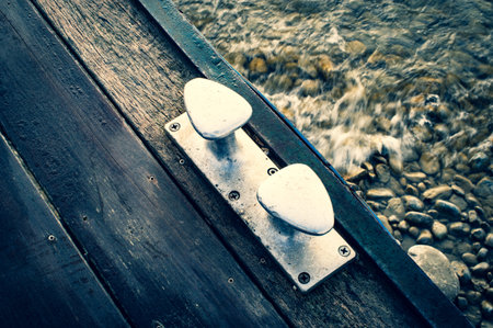 Boat dock on Lake Constance with a view of the Alps