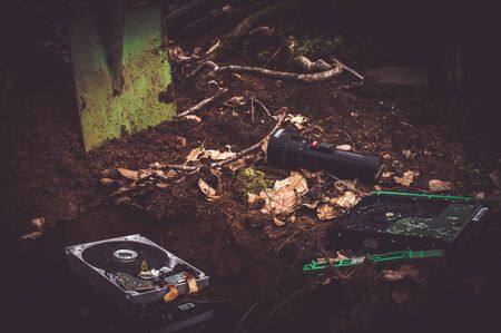 Hard disk buried in the forest to clarify a data protection problem in the event of data carrier destructionの写真素材