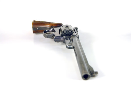 Loaded revolver on its side