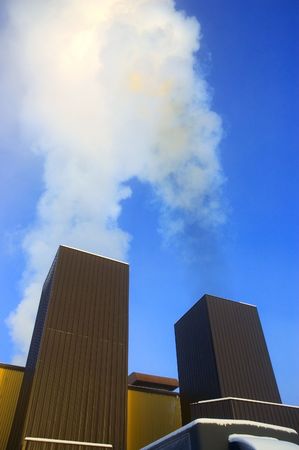 A power plant with exhaust steamの写真素材