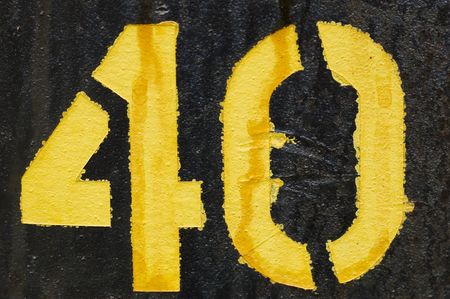 The number 40 spray painted on a black backgroundの写真素材