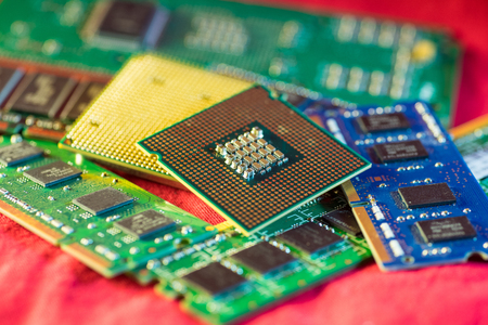 Two different types of CPUs on stacks of memory cards.の写真素材
