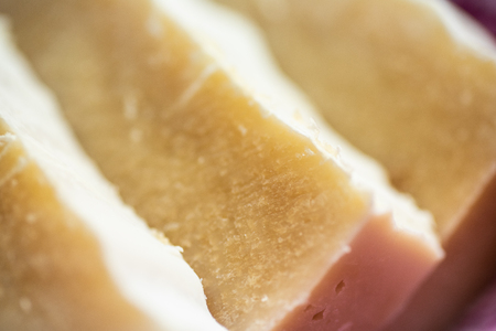 Several bars of hand crafted soap at an angle.の写真素材