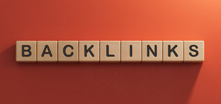 Backlinks - conceptual text with wooden cubes.3D rendering on red background.の写真素材