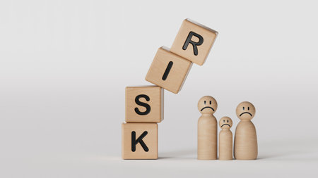 Conceptual image of risk with wooden blocks and wooden figurinesの写真素材