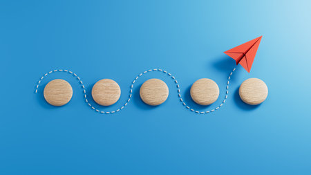 Red paper plane and wooden circles on blue background. 3d illustrationの写真素材