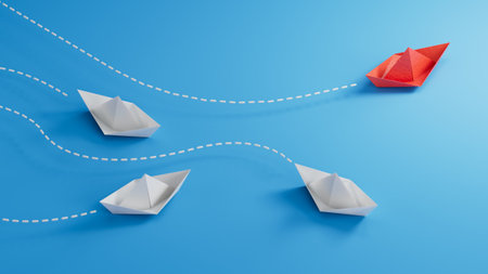 Red paper boat are different from others on blue background. Think different. Business for...