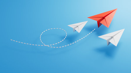 Individuality concept. Individual and unique leader red paper plane flies to the side. Think different.3D rendering on blue background.の写真素材