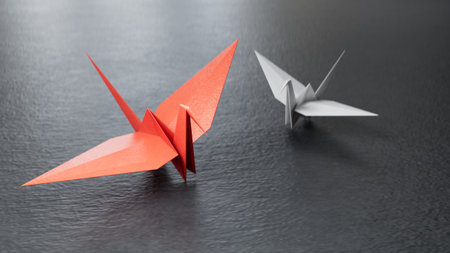 Origami Bird, bird paper crane. 3d illustration pair of bird paper craft for Hiroshima remembrance day minimal style concept. 3D rendering on black background.の写真素材