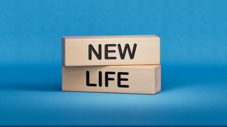 New life symbol. Wooden blocks with words New life.Business and New life concept. Wooden cube blocks. Copy space.3D rendering on blue background.の写真素材