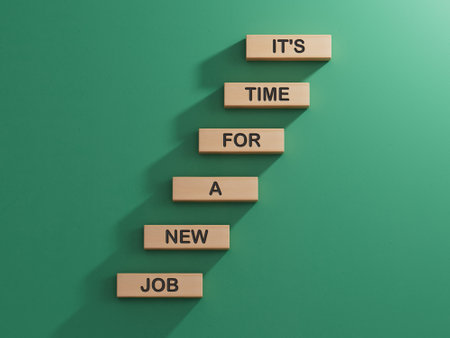 It is time for a new job symbol. Concept words It is time for a new job on wooden blocks.Business concept. Copy space.3D rendering on green background.の写真素材