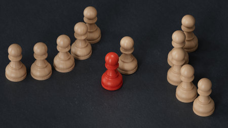 black and black pawns on a wooden table. leader teamwork and success. 3D rendering on black background.の写真素材