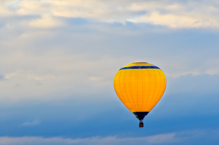 Air balloon on a blue sky backgroundの写真素材