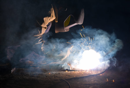 Welder brews metal constructions for pipes