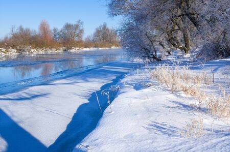 Winter river in sunny dayの写真素材