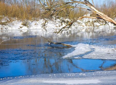 Winter river in sunny dayの写真素材