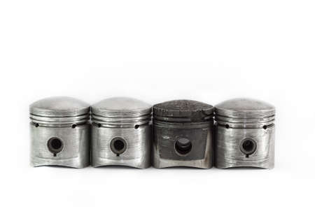 Pistons. One piston damaged by bad gasolineの写真素材