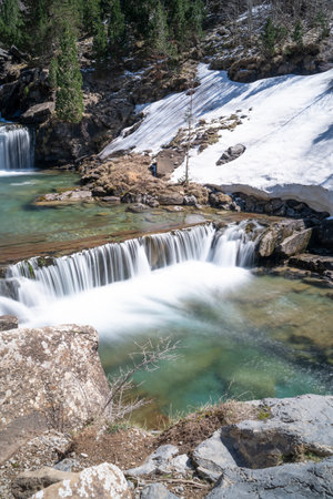 waterfall in the river in Ordesa National Park in the spanish Pyrenees (long exposure)の写真素材
