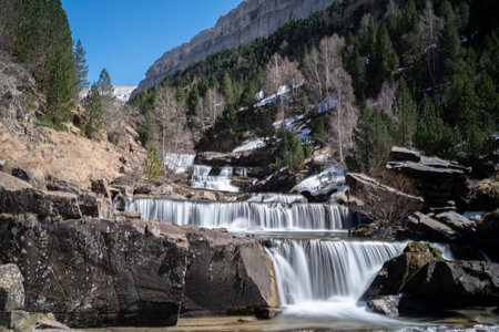 waterfall in the river in Ordesa National Park in the spanish Pyrenees (long exposure)の写真素材