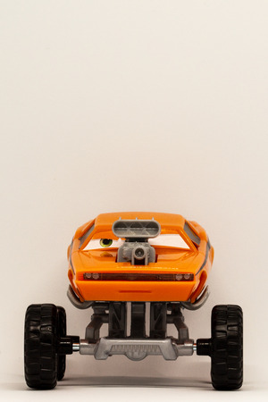 Gifts that can be found in an Easter egg. A four-wheel-drive vehicle in a children's toy version.の写真素材